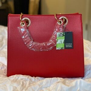 Badgley Michela red bag NWT. Never used still in package beautiful bag.